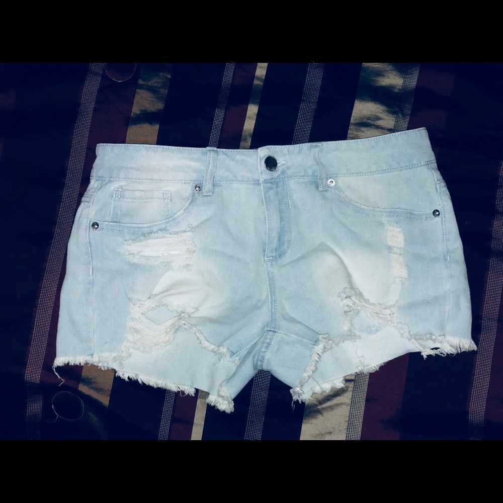 Distressed light blue denim shorts